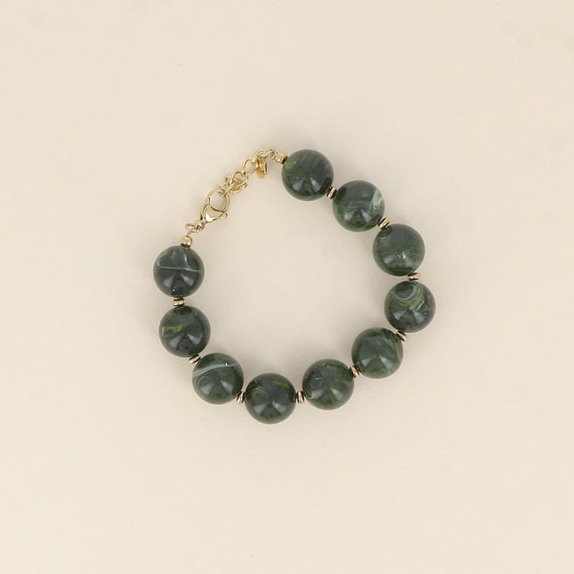 Bracelet on cable - resin ball beads