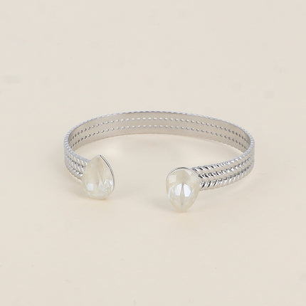 Jonc - anneau tressé orné de 2 cristaux Swarovski® en forme de goutte