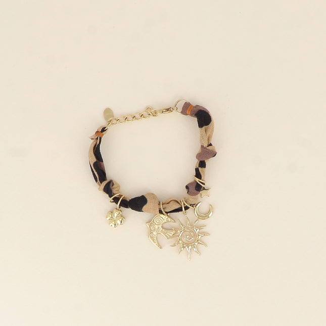 Bracelet - ribbon, fabric and charms (sun, bird, moon, star, clover)