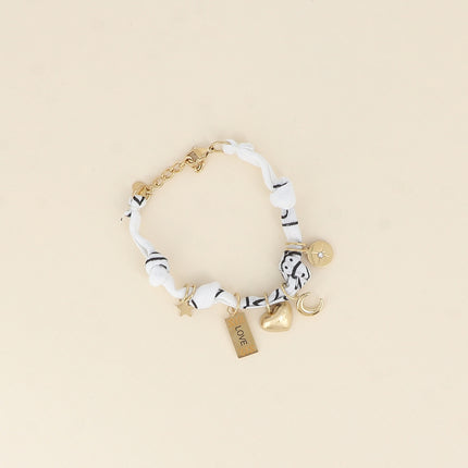 Bracelet - ruban, tissu et breloques (étoiles, coeur brossé, plaquette LOVE, lune)