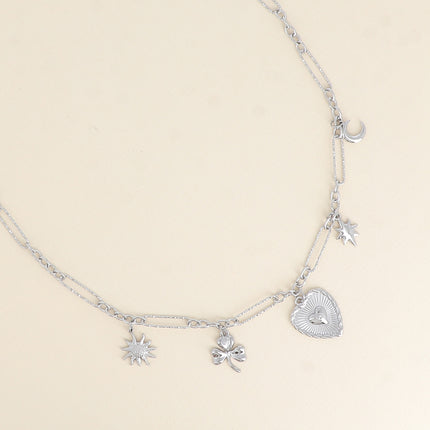 Collier - breloques (fleur, trèfle, coeur, étoile et lune)