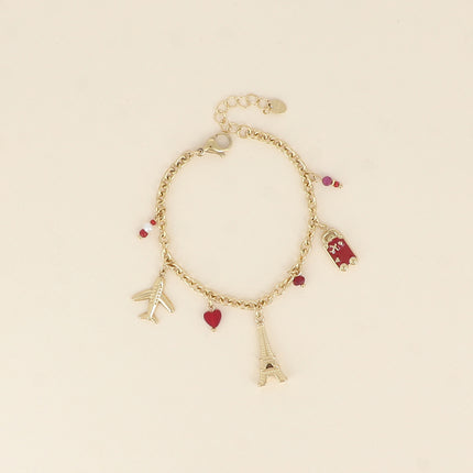 Bracelet - tour eiffel, avions, coeur, bouche et platquette AMOUR en émail