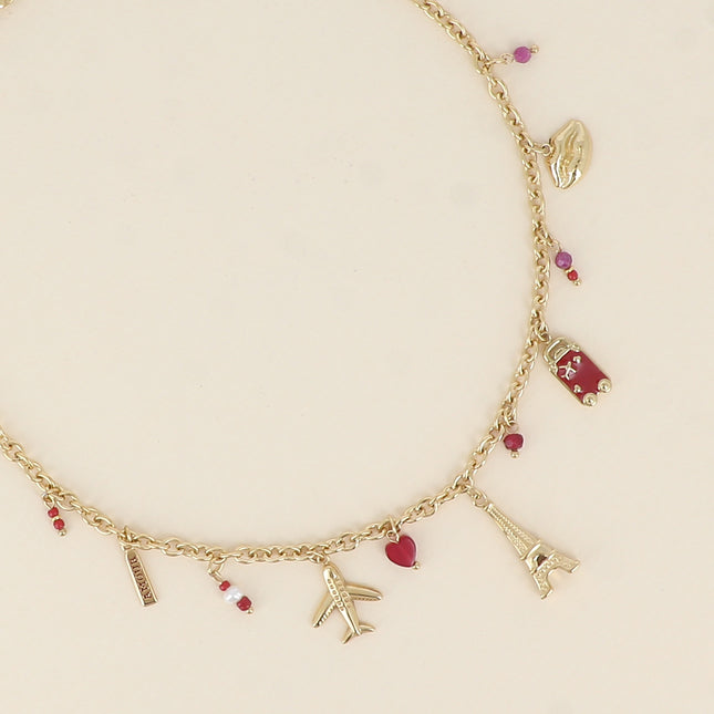 Collier - tour eiffel, avions, coeur, bouche et platquette AMOUR en émail