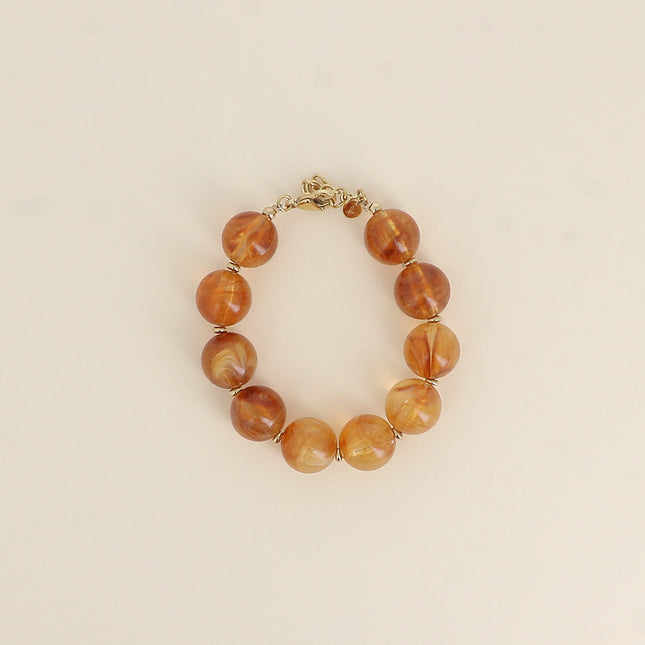 Bracelet on cable - resin ball beads