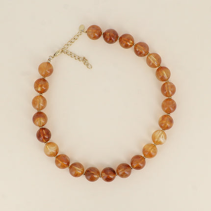 Collier sur câble - perles boules en résine