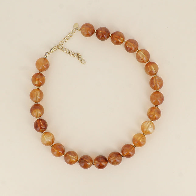 Collier sur câble - perles boules en résine