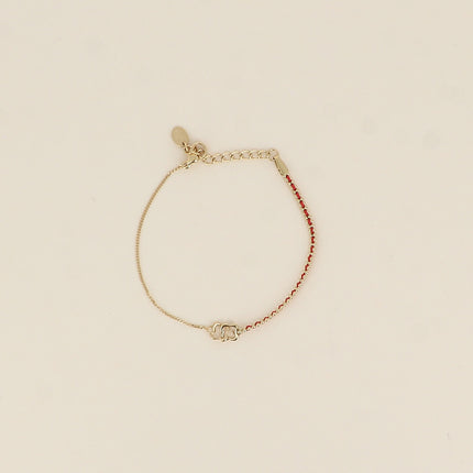 Bracelet - braided wire, openwork double clover pendant