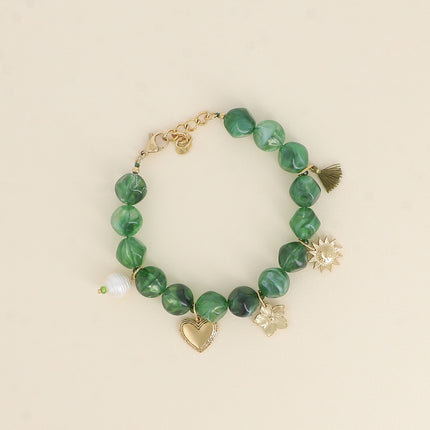 Avelyne bracelet - pompom, sun, flower, heart and freshwater pearl