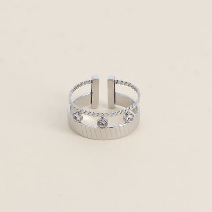 Bague - anneau strié et 3 cristaux