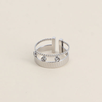 Bague - anneau strié et 3 cristaux
