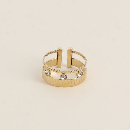 Bague - anneau strié et 3 cristaux