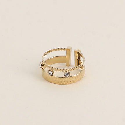 Bague - anneau strié et 3 cristaux