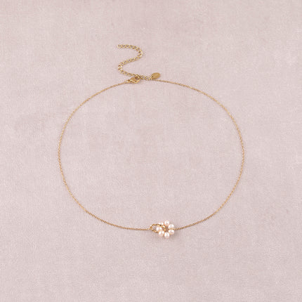 Collier - anneau torsadé et perles d'eau douce