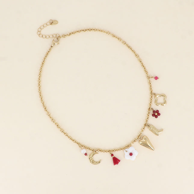 Collier - lune, pompon, fleur nacrée, coeur, botte, fleur perlée, trèfle ajouré
