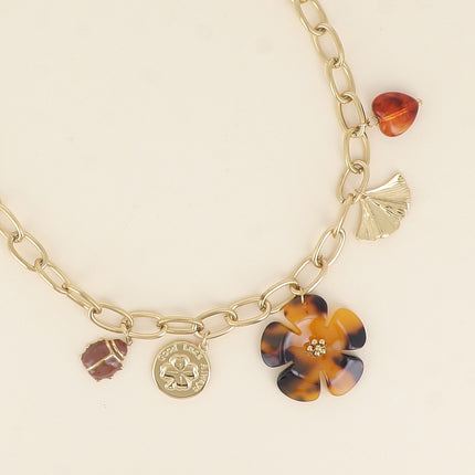 Necklace - ladybug, clover piece, leopard resin flower, ginko, and resin heart