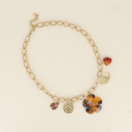 Necklace - ladybug, clover piece, leopard resin flower, ginko, and resin heart