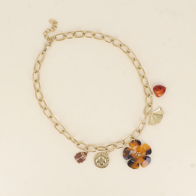 Necklace - ladybug, clover piece, leopard resin flower, ginko, and resin heart