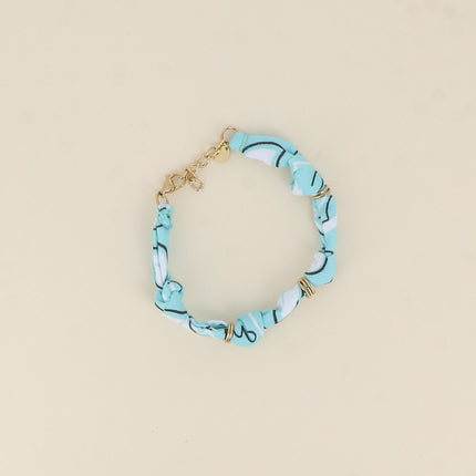 Bracelet - ruban bandana et anneaux en acier inoxydable