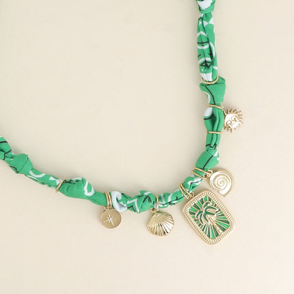 Collier Aventura - ruban et coquillage, étoile, soleil, plaquette palmier et émail