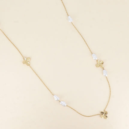 Sautoir - pendentifs fleurs et perles de résine