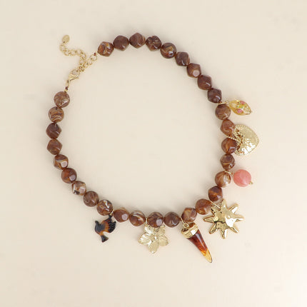 Théa Necklace - flower, resin horn, sun, resin beads, heart