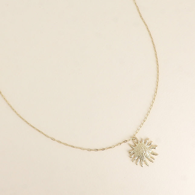 Collier - pendentif soleil texturé