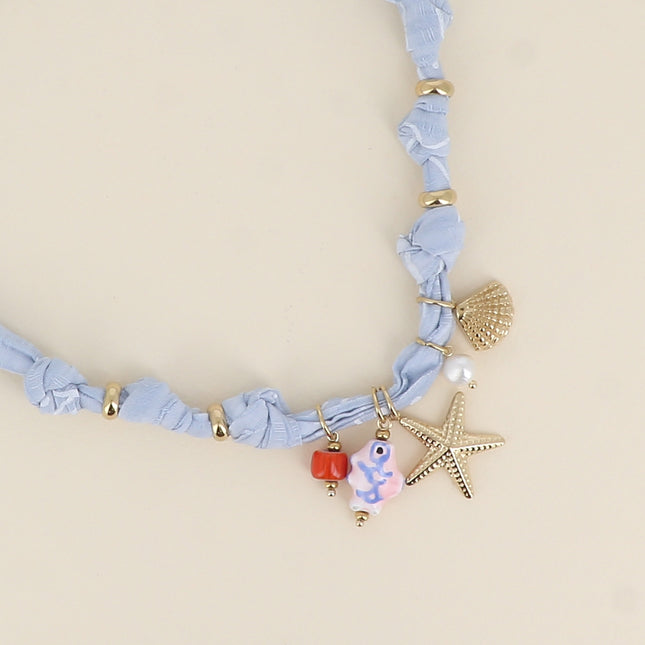 Collier Blue - tissu ruban, céramique émaillée, coquillage, étoile de mer et perles d'eau douce