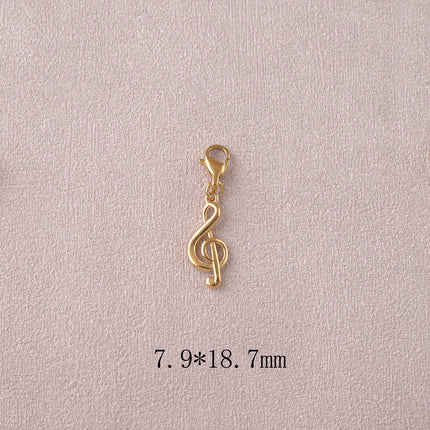 Treble clef charm