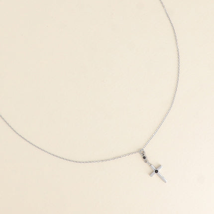Collier - croix religieuse et d'un cristal