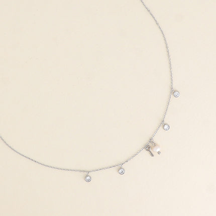 Collier - 4 cristaux, perle d'eau douce et clé coeur