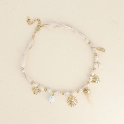 Collier - tissu ruban, perle en céramique émaillée, soleil, corne en résine, coeur texturé