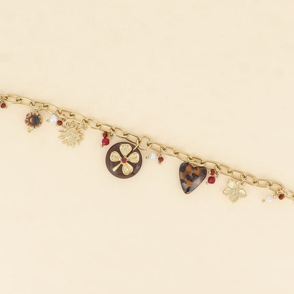 Bracelet - fleur en céramique émaillée, soleil, trèfle sur pièce ronde en résine, coeur léopard, fleur
