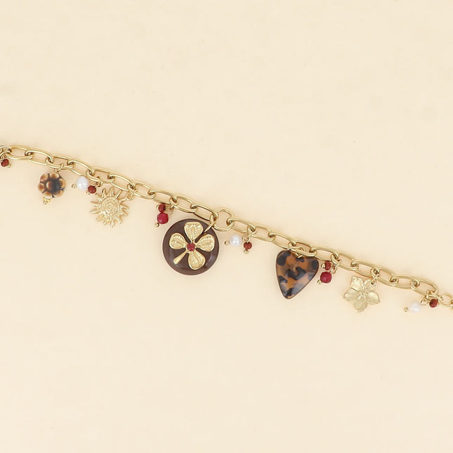 Bracelet - fleur en céramique émaillée, soleil, trèfle sur pièce ronde en résine, coeur léopard, fleur
