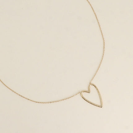 Collier - pendentif coeur ajouré martelé