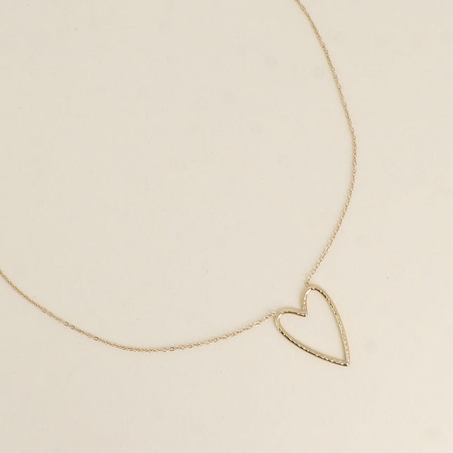 Collier - pendentif coeur ajouré martelé