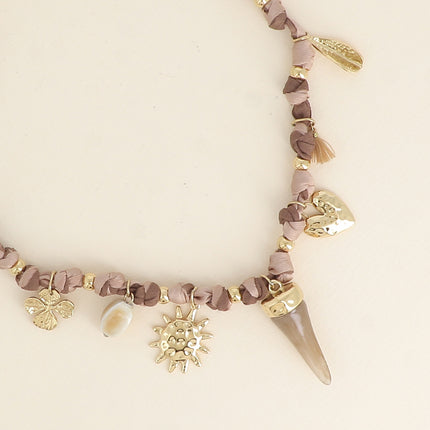 Collier - tissu ruban, perle en céramique émaillée, soleil, corne en résine, coeur texturé