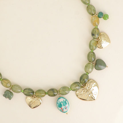 Avely necklace - on a cable chain, with hearts, an elephant, beads, and engraved flowers