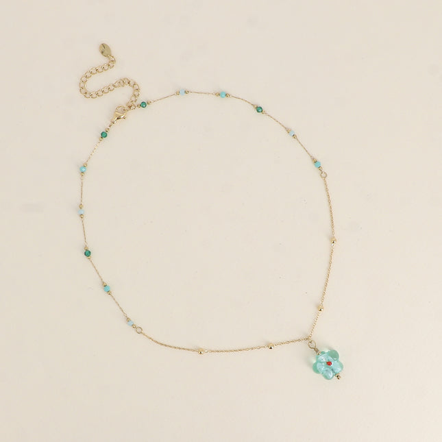 Collier - pierres naturelles et pendentif fleur en résine