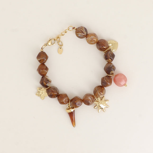 Bracelet Théa - fleur, corne en résine, soleil, perles en résine, coeur