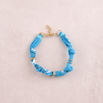 Bracelet - ruban bandana et anneaux en acier inoxydable