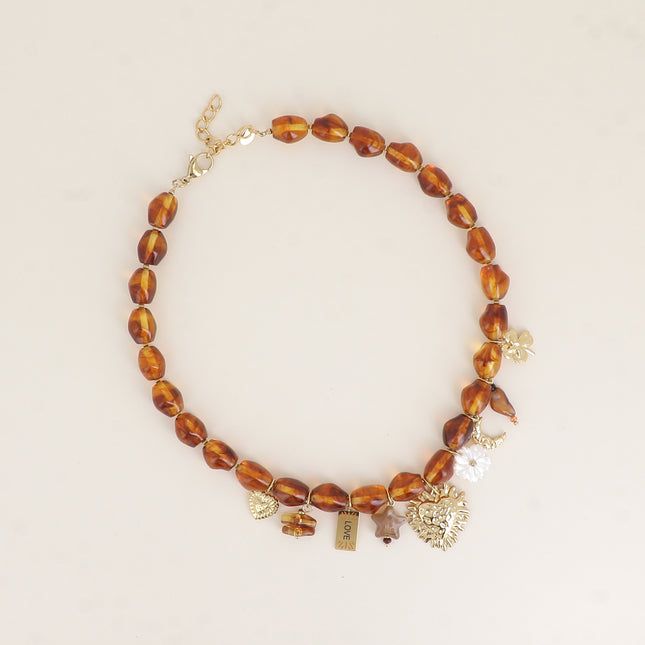 Collier - coeurs, plaquette LOVE, étoile, fleur nacrée, croissant de lune, trèfle, résine