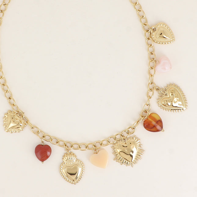 Collier - breloques coeurs en résine et en acier
