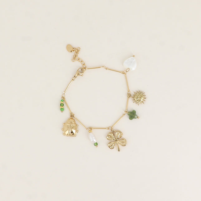 Bracelet - perles, coccinnelle, perle d'eau douce, trèfle, soleil, coeur nacré