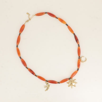 Collier sur câble - perles en résine, lune, oiseau, soleil