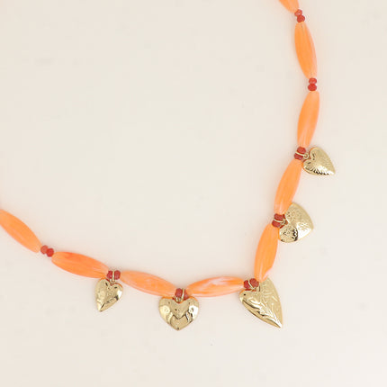 Amora necklace - on a cable, resin beads, heart-shaped flower-engraved charms
