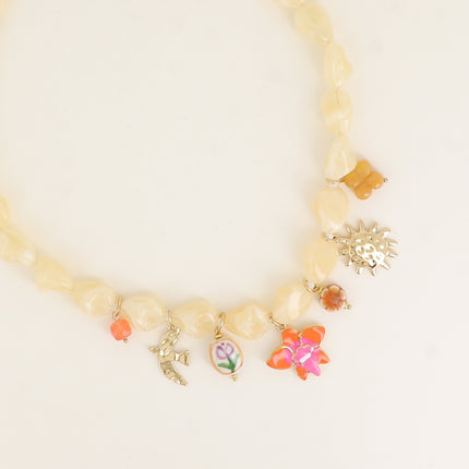 Dune Necklace - on wire, resin beads, bird, ceramic bead, orchid flower, sun