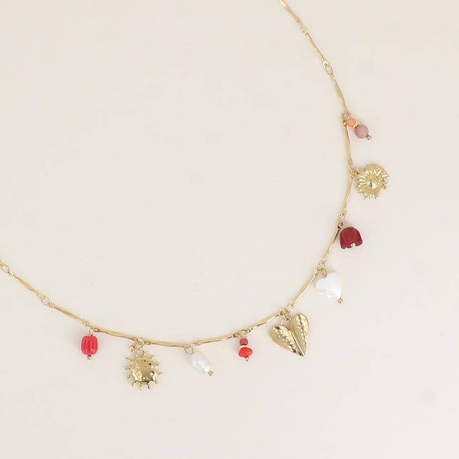 Collier - perle d'eau douce, soleil, coeurs, fleurs
