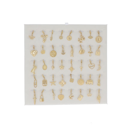 Kit de 40 charms en acier inoxydable - doré - prix de 2,20€/pc