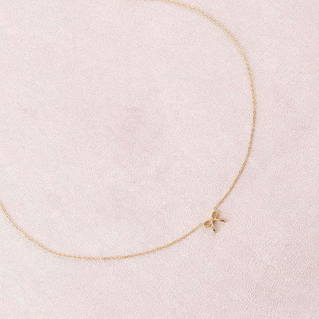 Collier - pendentif noeud papillon