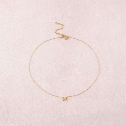Collier - pendentif noeud papillon